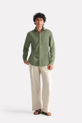 Beige linen blend drawstring trouser, worn by a model, by SOLA Pakistan.