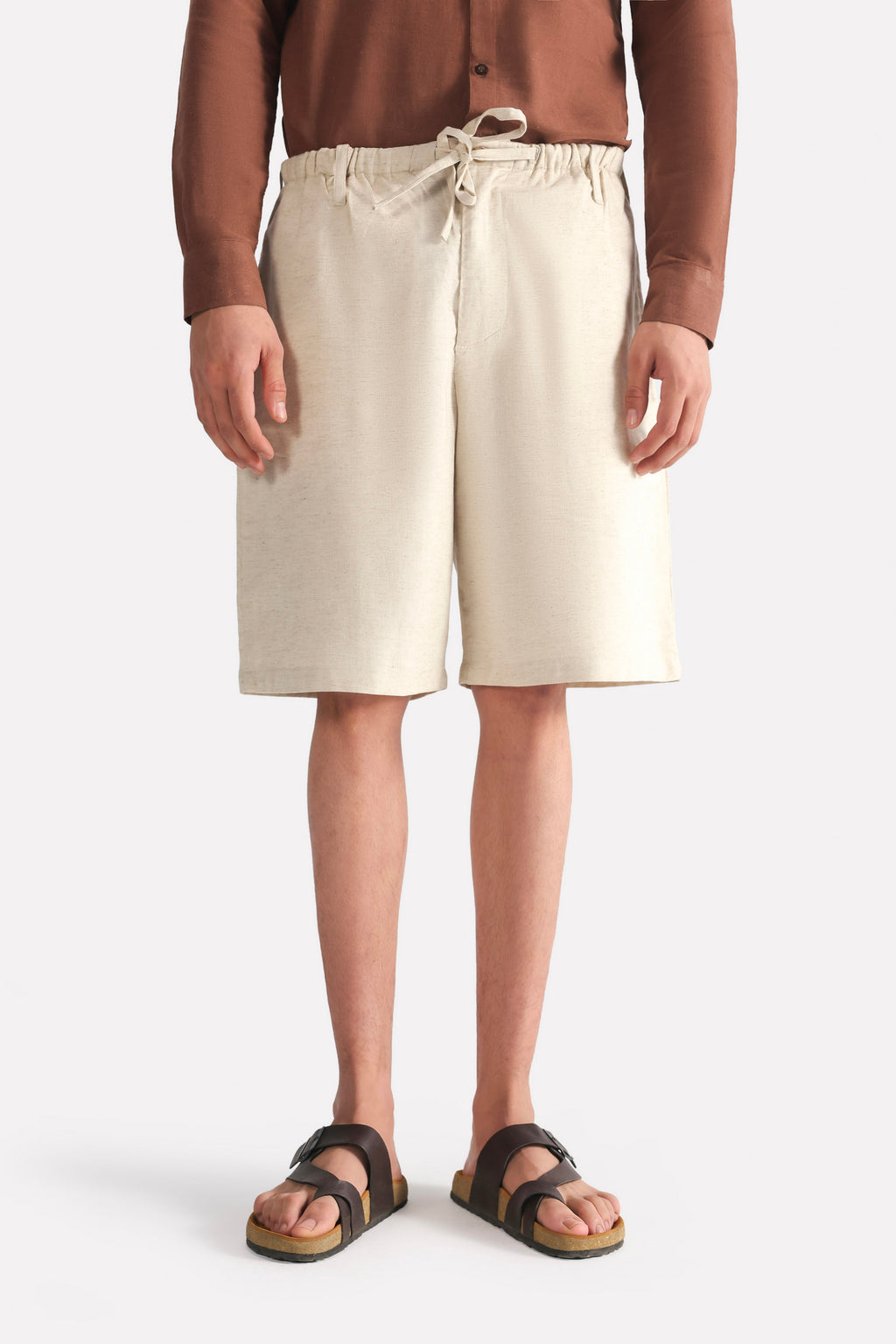 Beige linen drawstring shorts, full styled look, by SOLA Pakistan.