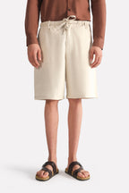 Beige linen drawstring shorts, full styled look, by SOLA Pakistan.