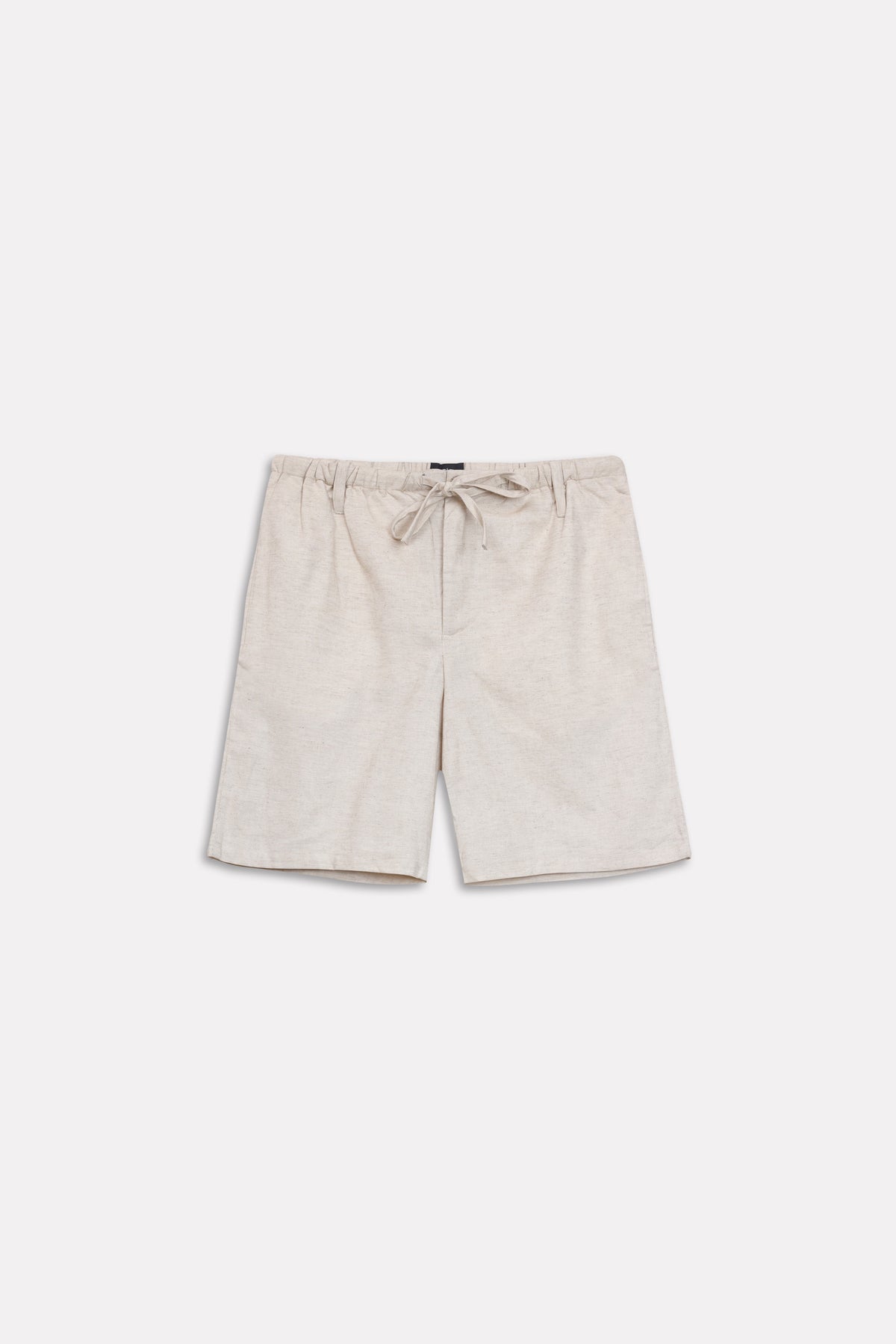Texture and fabric detail, beige linen drawstring shorts, by SOLA Pakistan.