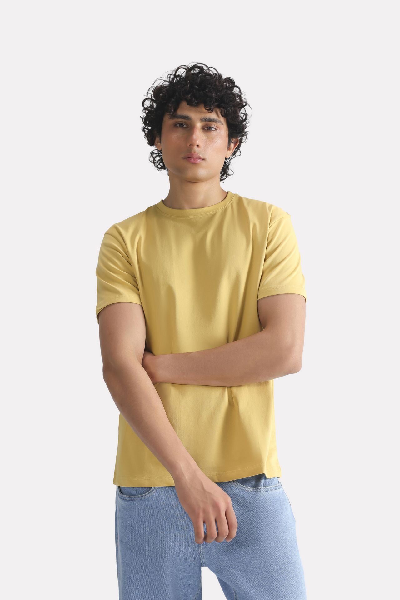 Close-up detail on the beige regular fit crew neck t-shirt, by SOLA Pakistan.
