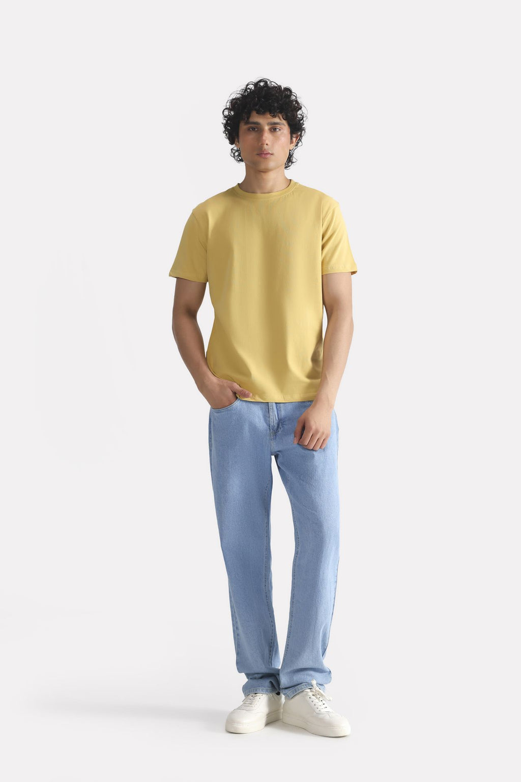 Beige regular fit crew neck t-shirt shown in a styled fit, by SOLA Pakistan.