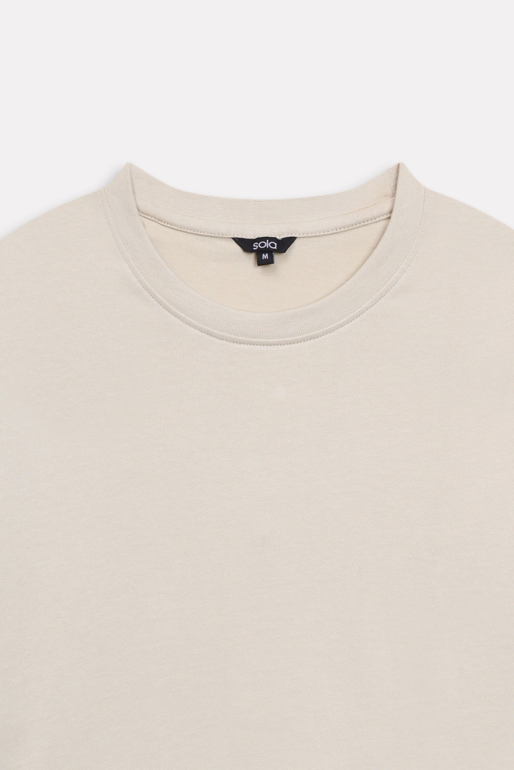 Additional view of the beige (sand) drop shoulder cotton t-shirt, by SOLA Pakistan.