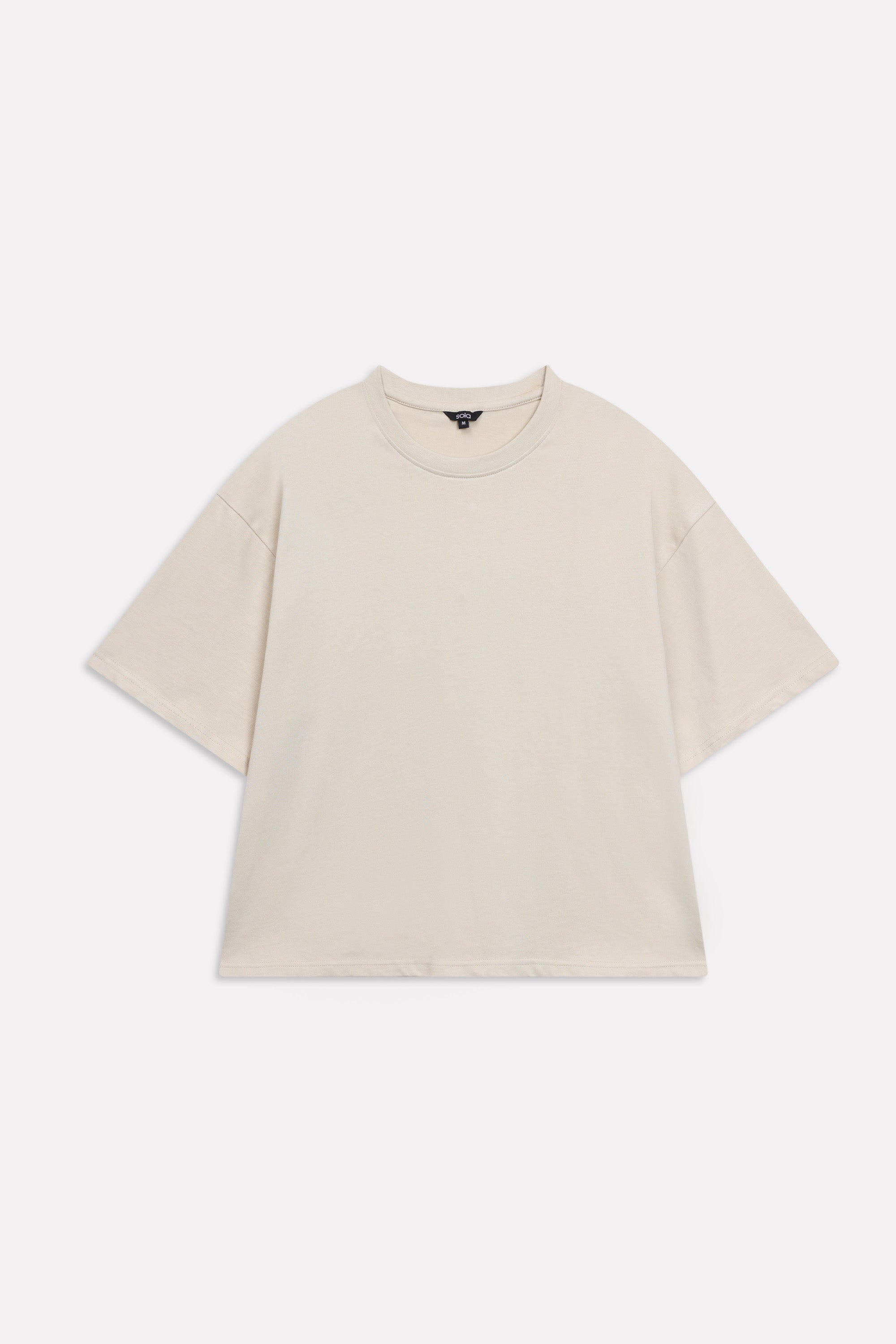 Beige (sand) drop shoulder cotton t-shirt, alternate angle, by SOLA Pakistan.