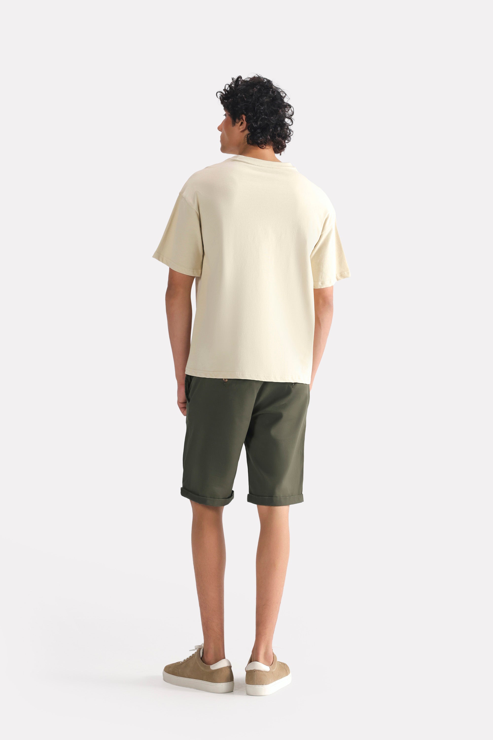 Flat lay of the beige (sand) drop shoulder cotton t-shirt, by SOLA Pakistan.
