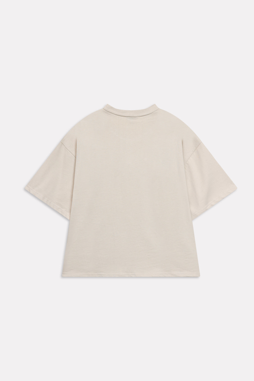 Texture and fabric detail, beige (sand) drop shoulder cotton t-shirt, by SOLA Pakistan.