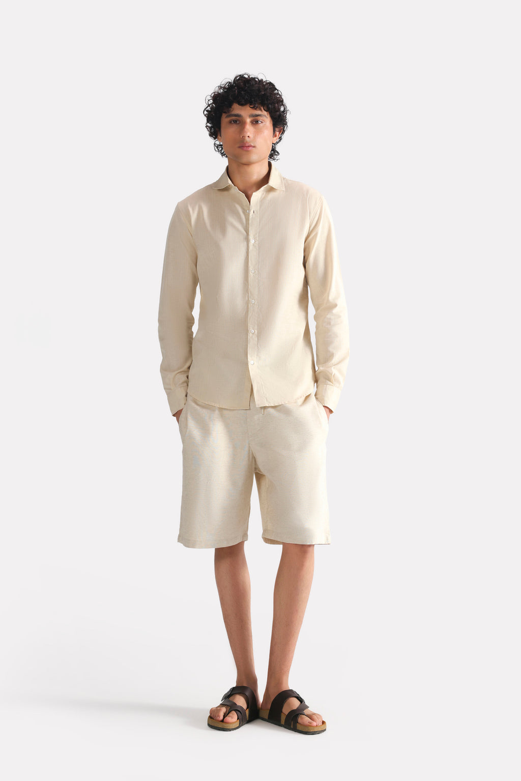 Close-up detail on the beige (sand) relaxed cotline shirt, by SOLA Pakistan.