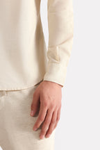 Beige (sand) relaxed cotline shirt shown in a styled fit, by SOLA Pakistan.