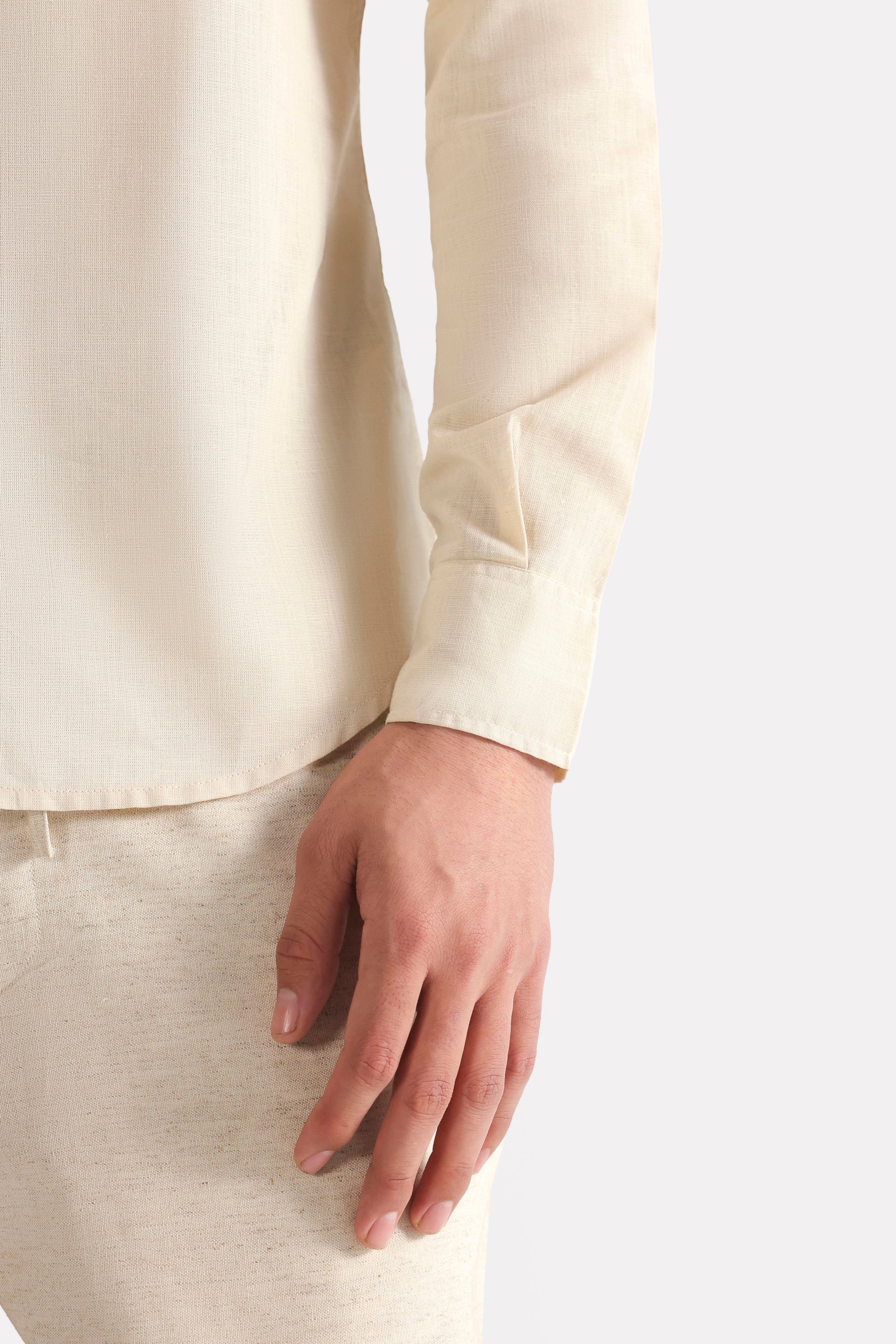 Beige (sand) relaxed cotline shirt shown in a styled fit, by SOLA Pakistan.