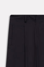 Additional view of the black barrel-leg pleated trouser, by SOLA Pakistan.