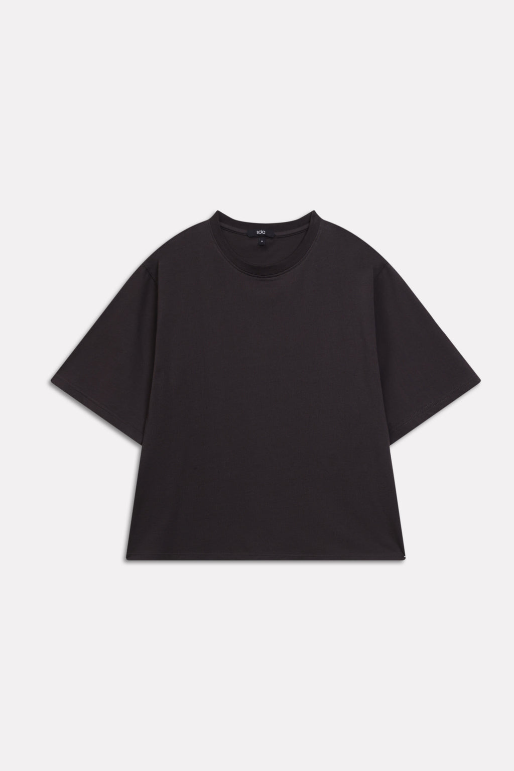 Black drop shoulder cotton t-shirt, alternate angle, by SOLA Pakistan.