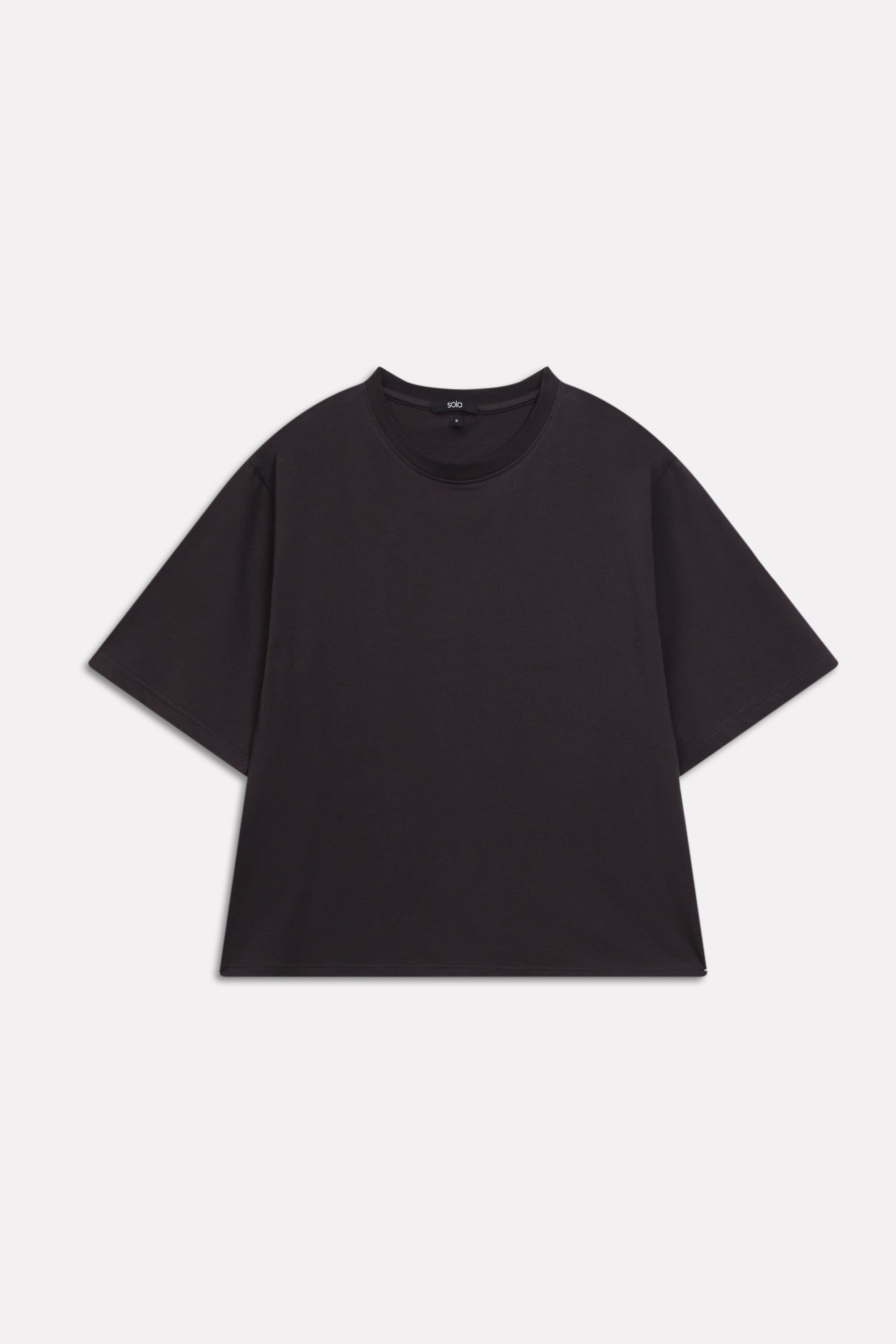 Black drop shoulder cotton t-shirt, alternate angle, by SOLA Pakistan.