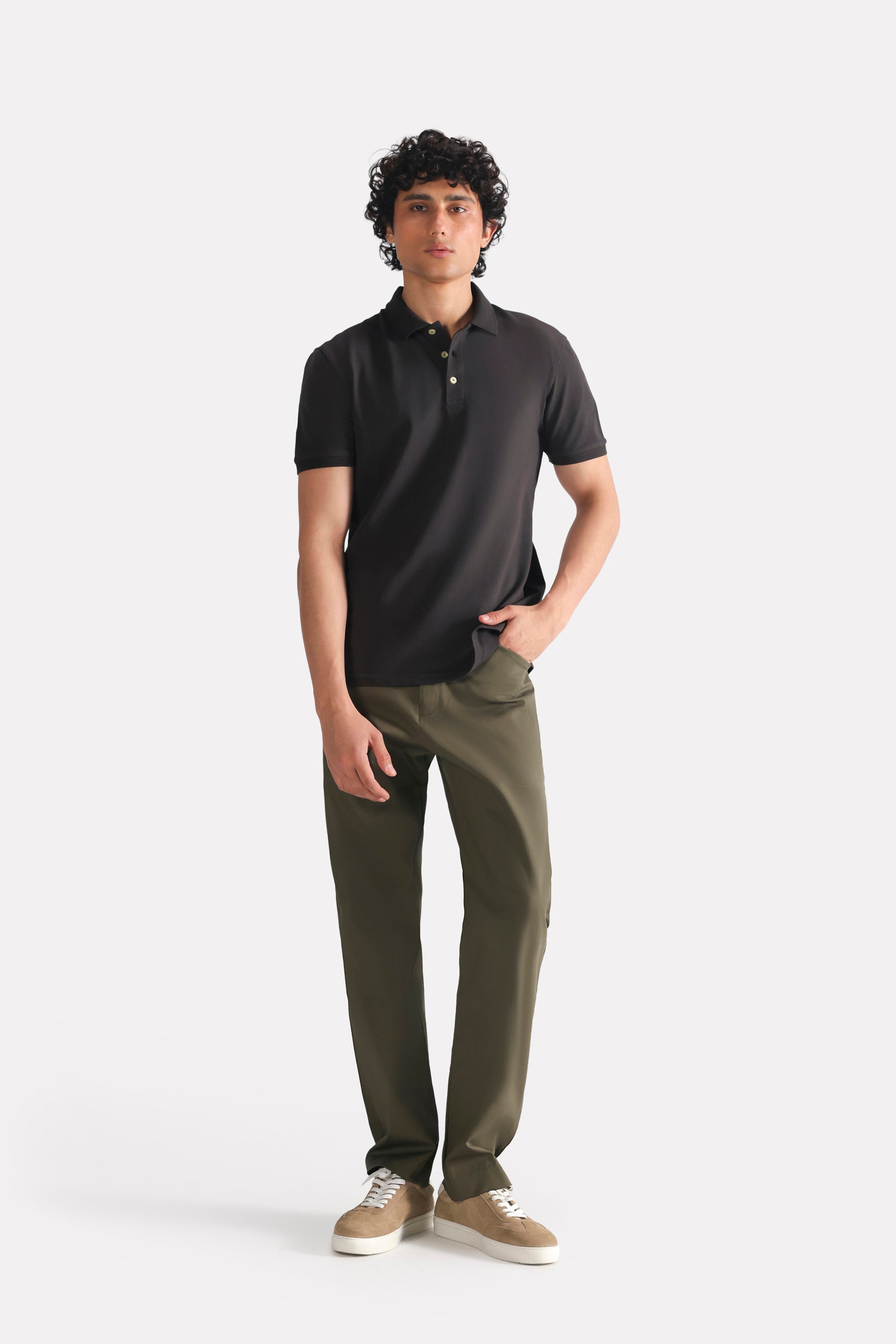 Black micro-textured cotton pique polo, full styled look, by SOLA Pakistan.