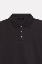 Texture and fabric detail, black micro-textured cotton pique polo, by SOLA Pakistan.