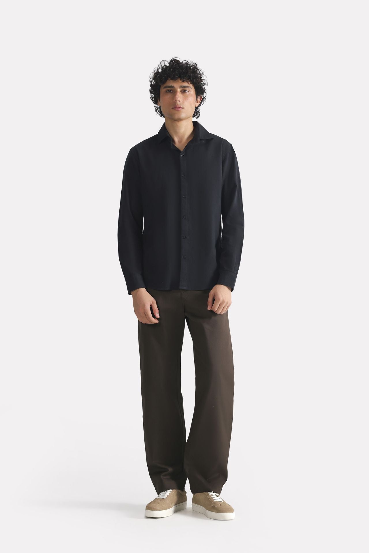 Close-up detail on the black regular fit cotton shirt, by SOLA Pakistan.