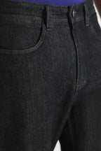 Close-up detail on the black regular fit jean, by SOLA Pakistan.