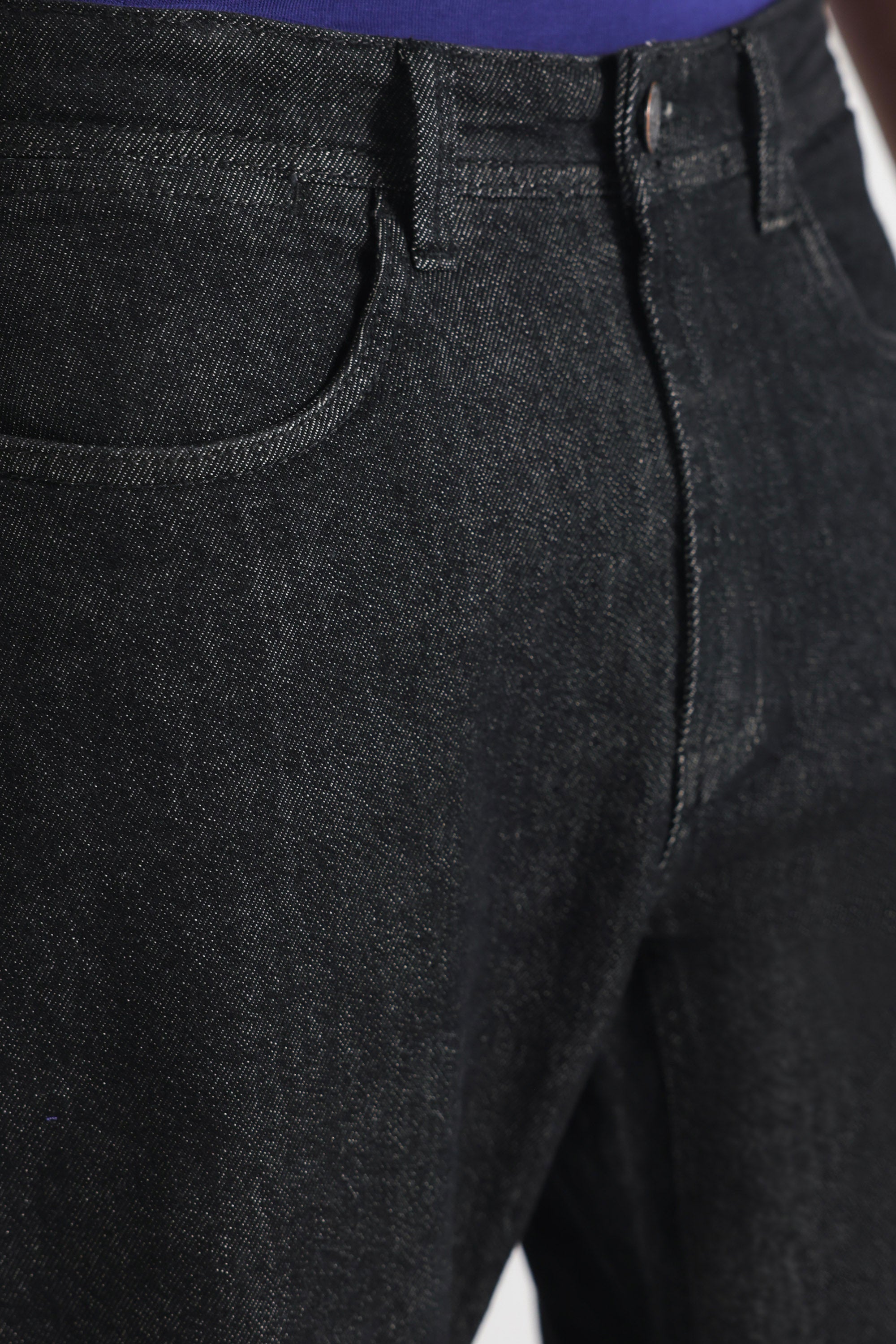Close-up detail on the black regular fit jean, by SOLA Pakistan.