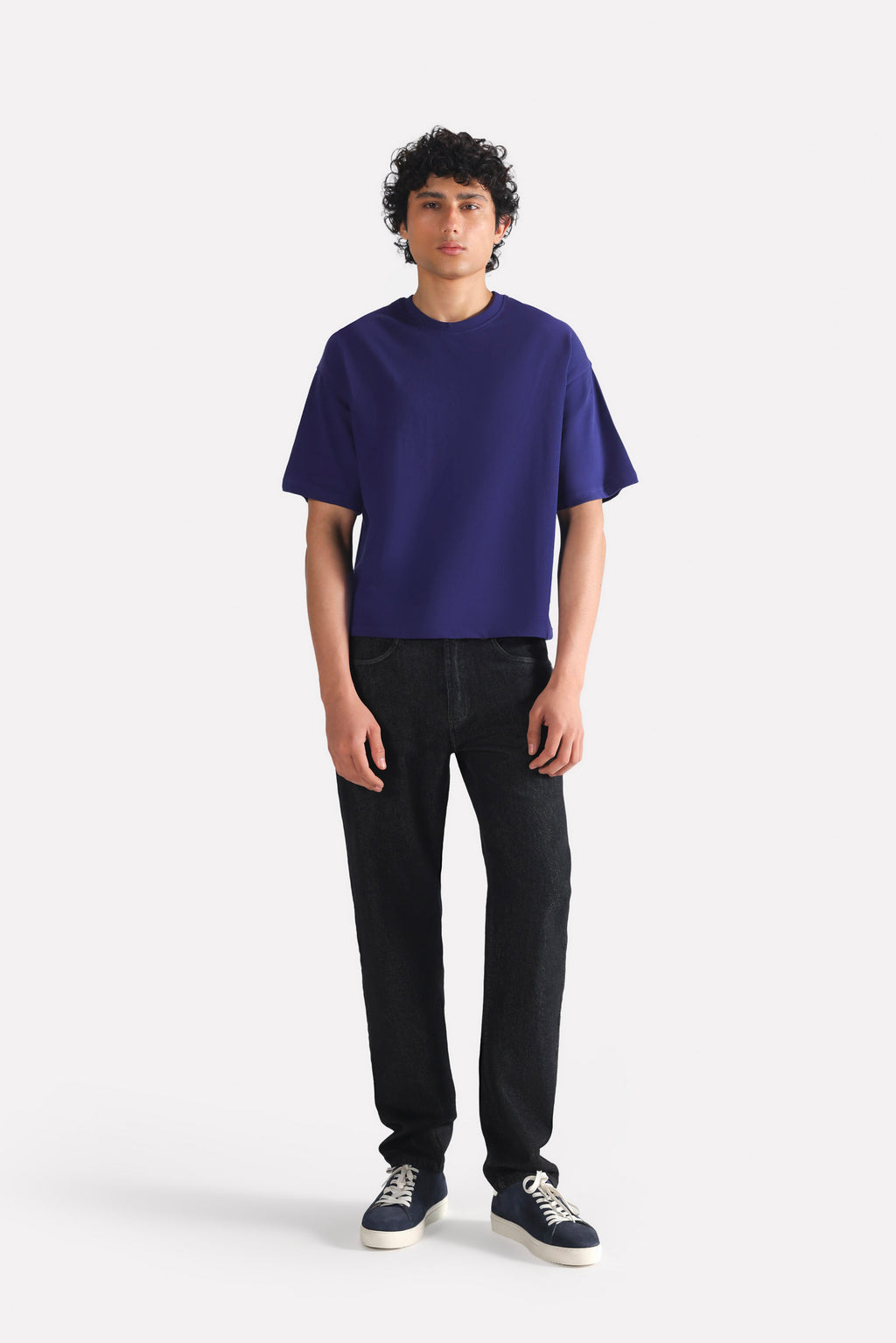 Black regular fit jean in cotton, worn by a model, by SOLA Pakistan.