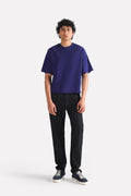 Black regular fit jean in cotton, worn by a model, by SOLA Pakistan.
