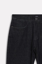 Texture and fabric detail, black regular fit jean, by SOLA Pakistan.
