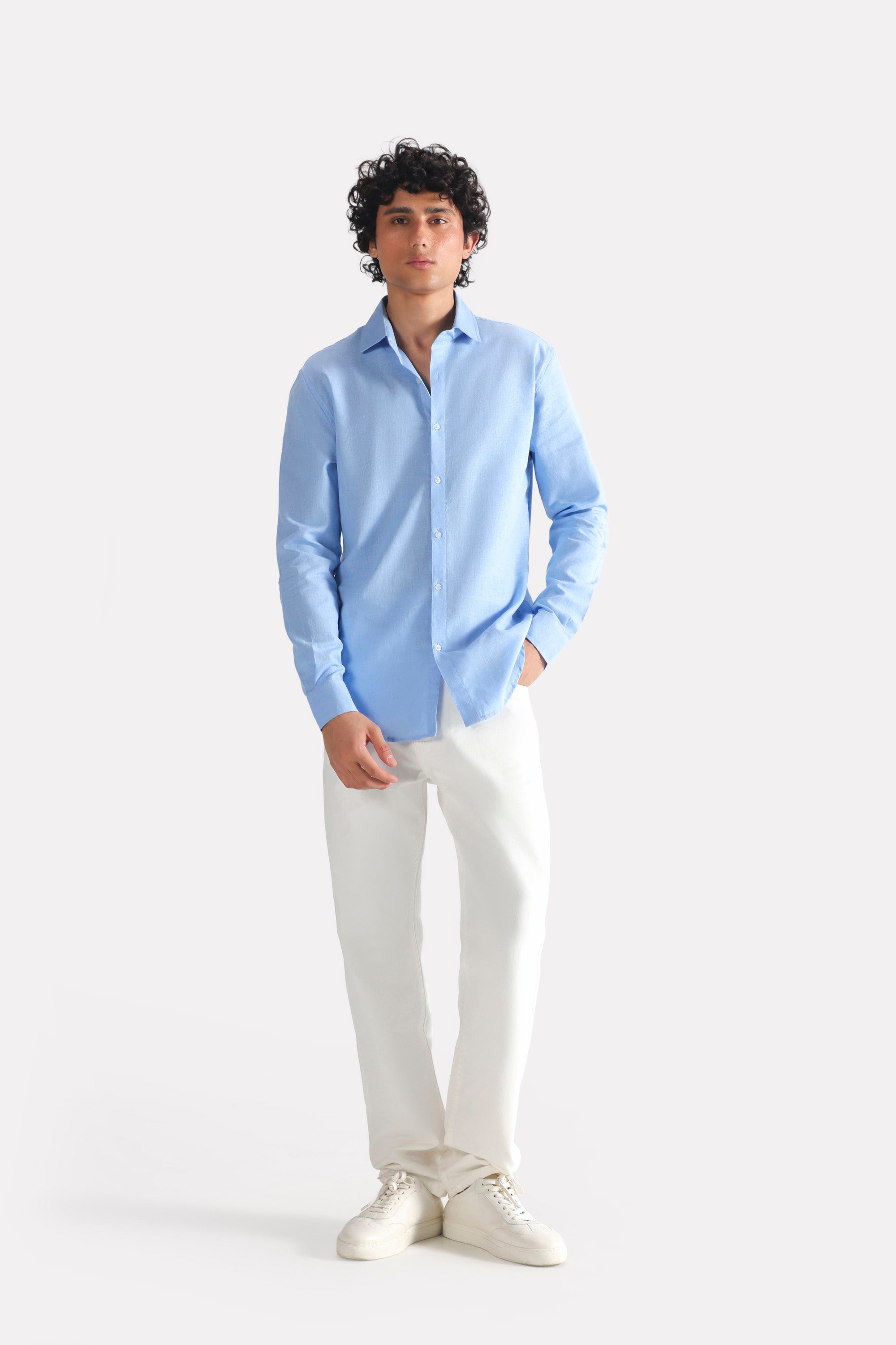 Close-up detail on the blue (french blue) relaxed cotline shirt, by SOLA Pakistan.