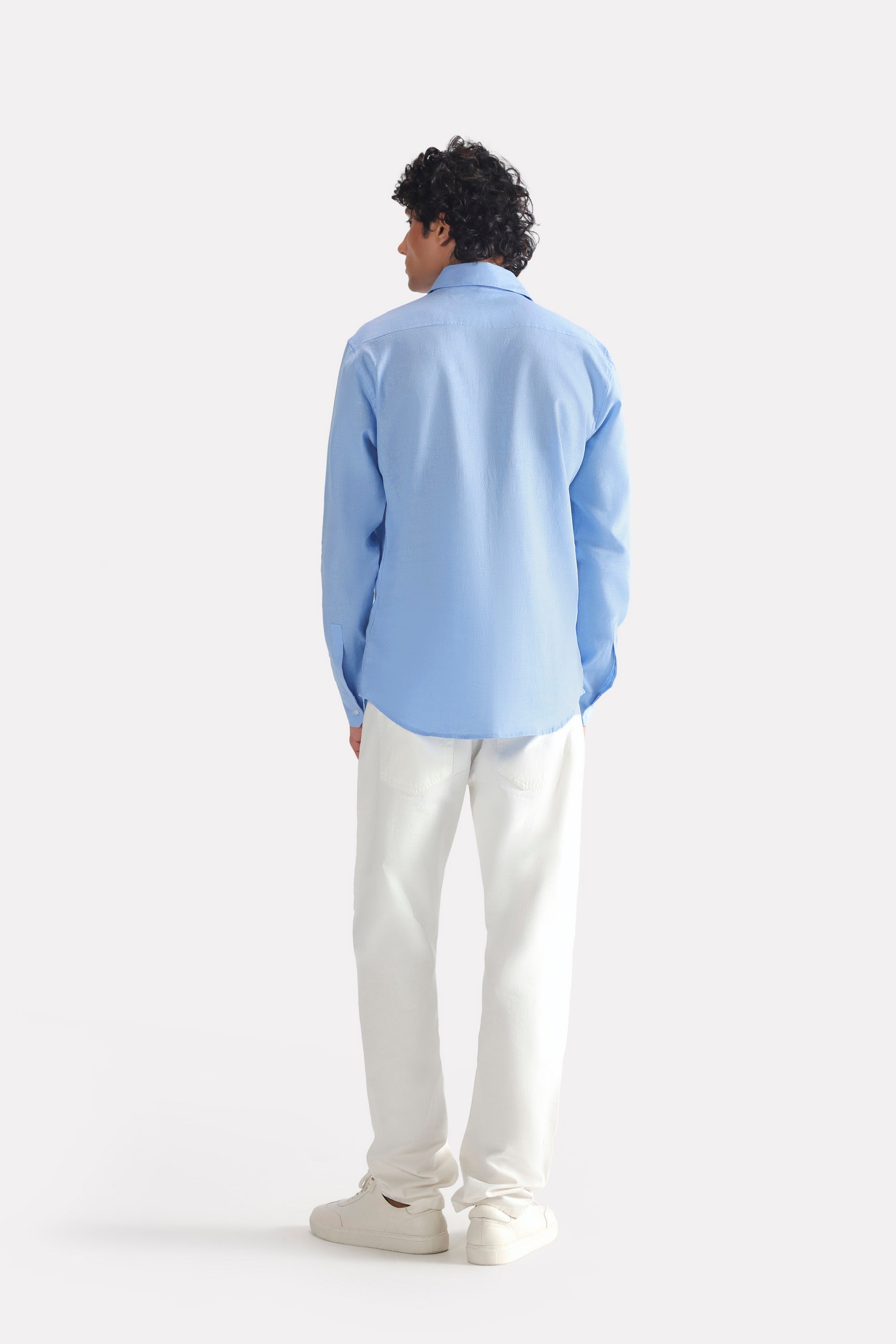 Flat lay of the blue (french blue) relaxed cotline shirt, by SOLA Pakistan.