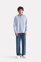 Close-up detail on the blue stripe relaxed fit striped shirt, by SOLA Pakistan.