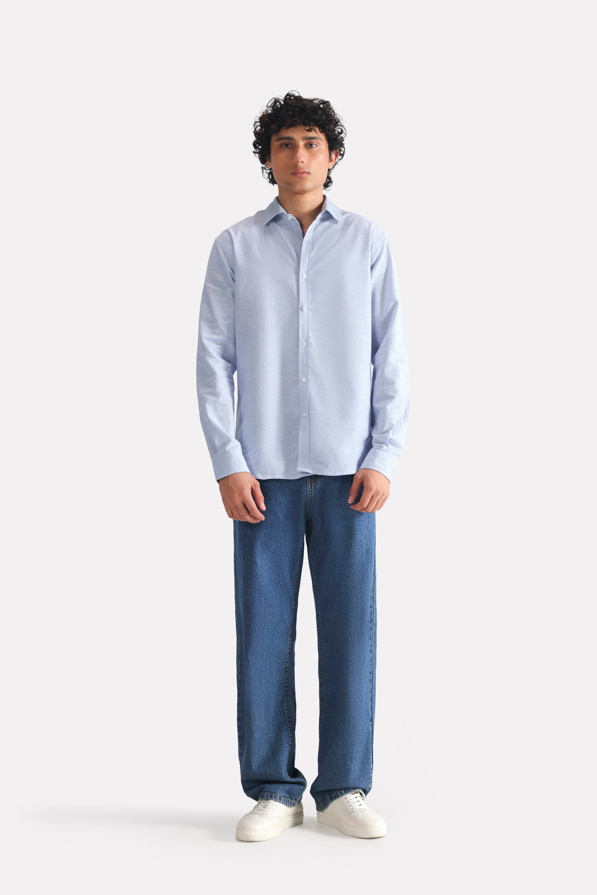 Close-up detail on the blue stripe relaxed fit striped shirt, by SOLA Pakistan.