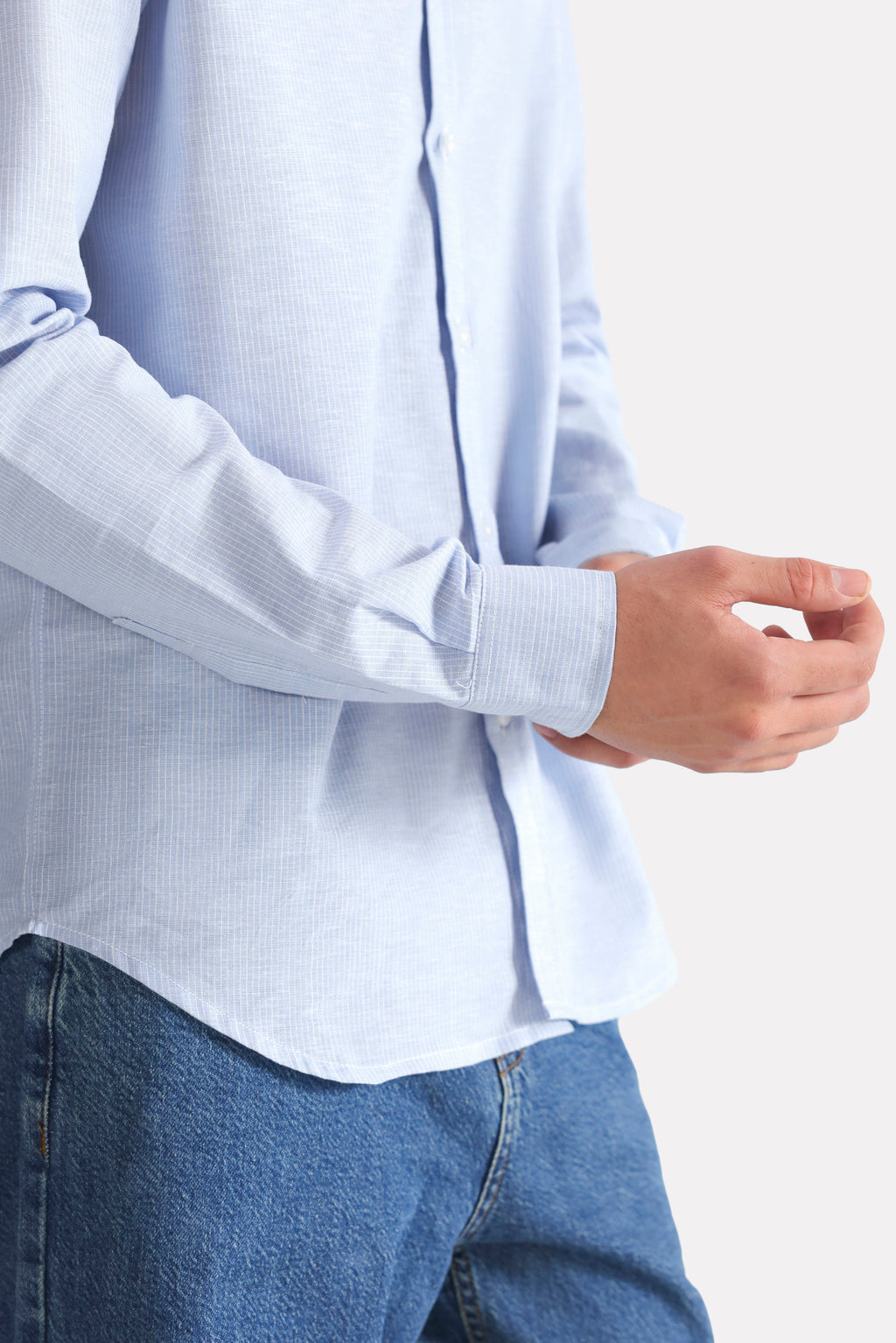 Flat lay of the blue stripe relaxed fit striped shirt, by SOLA Pakistan.