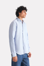Blue stripe relaxed fit striped shirt shown in a styled fit, by SOLA Pakistan.