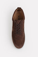 Brown essence suede trainer shown in detail, by SOLA Pakistan.
