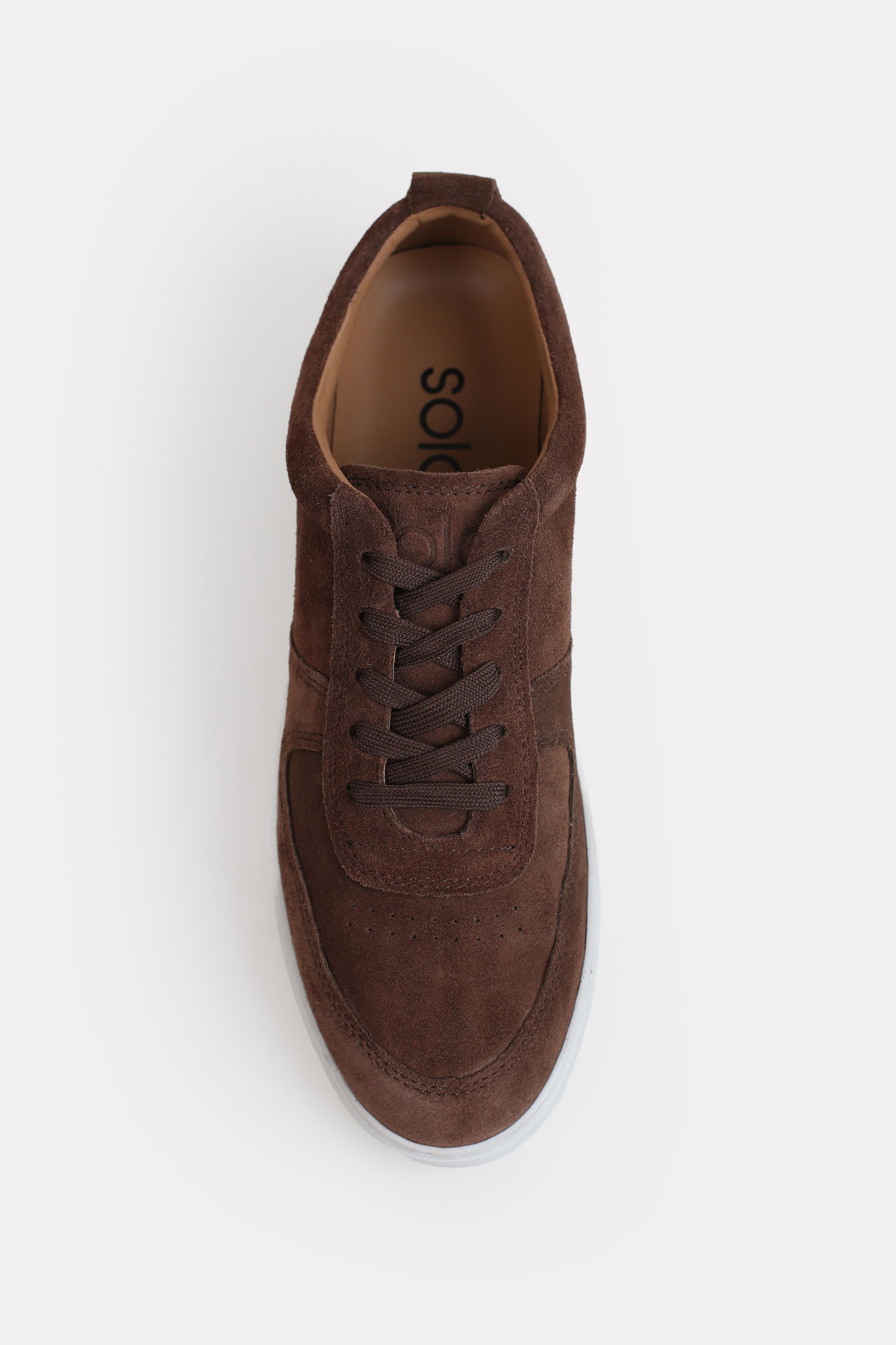 Brown essence suede trainer shown in detail, by SOLA Pakistan.