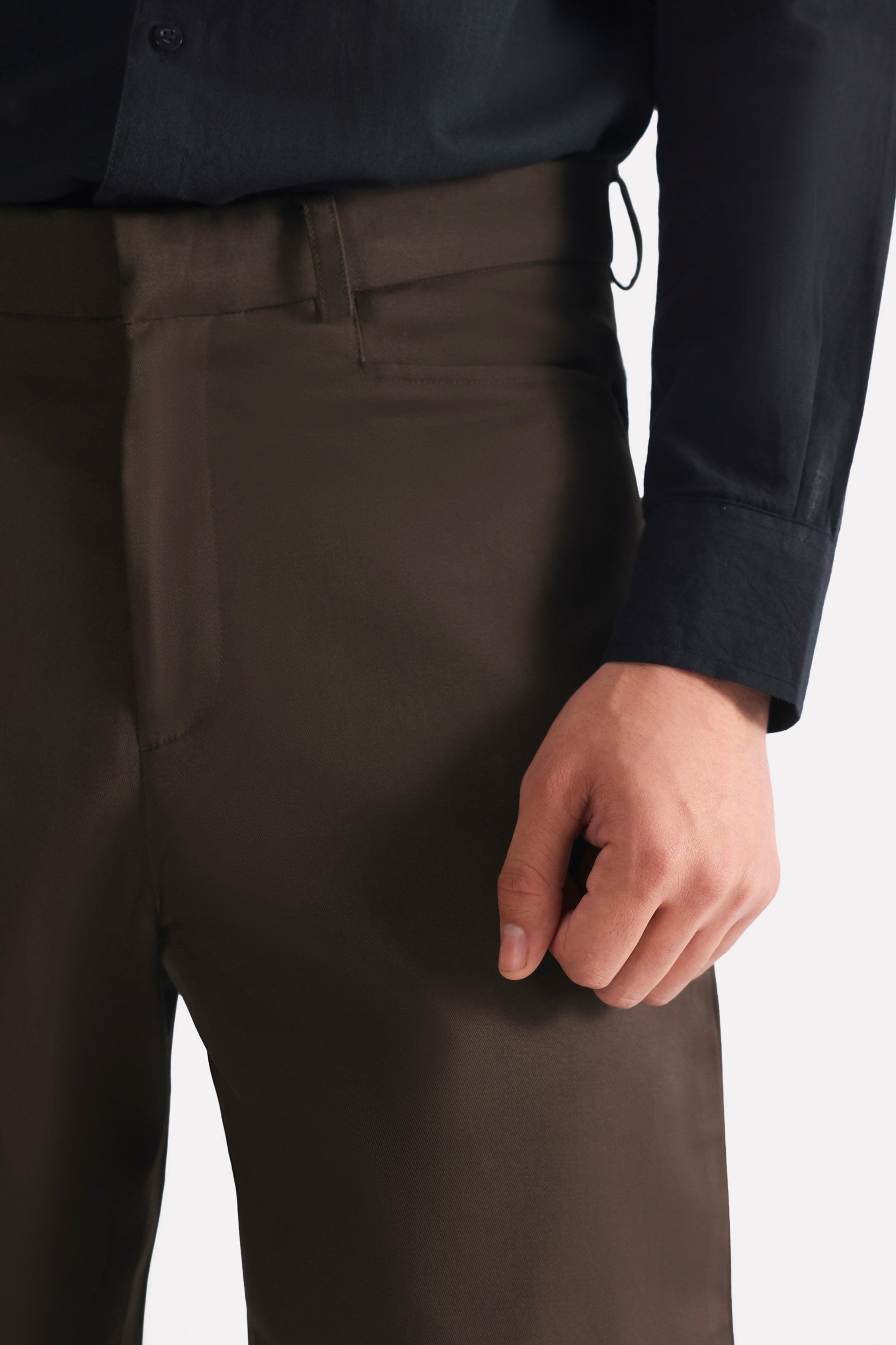 Close-up detail on the brown (turkish coffee) straight fit cotton trouser, by SOLA Pakistan.