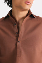 Chocolate brown pop over half-placket shirt shown in a styled fit, by SOLA Pakistan.