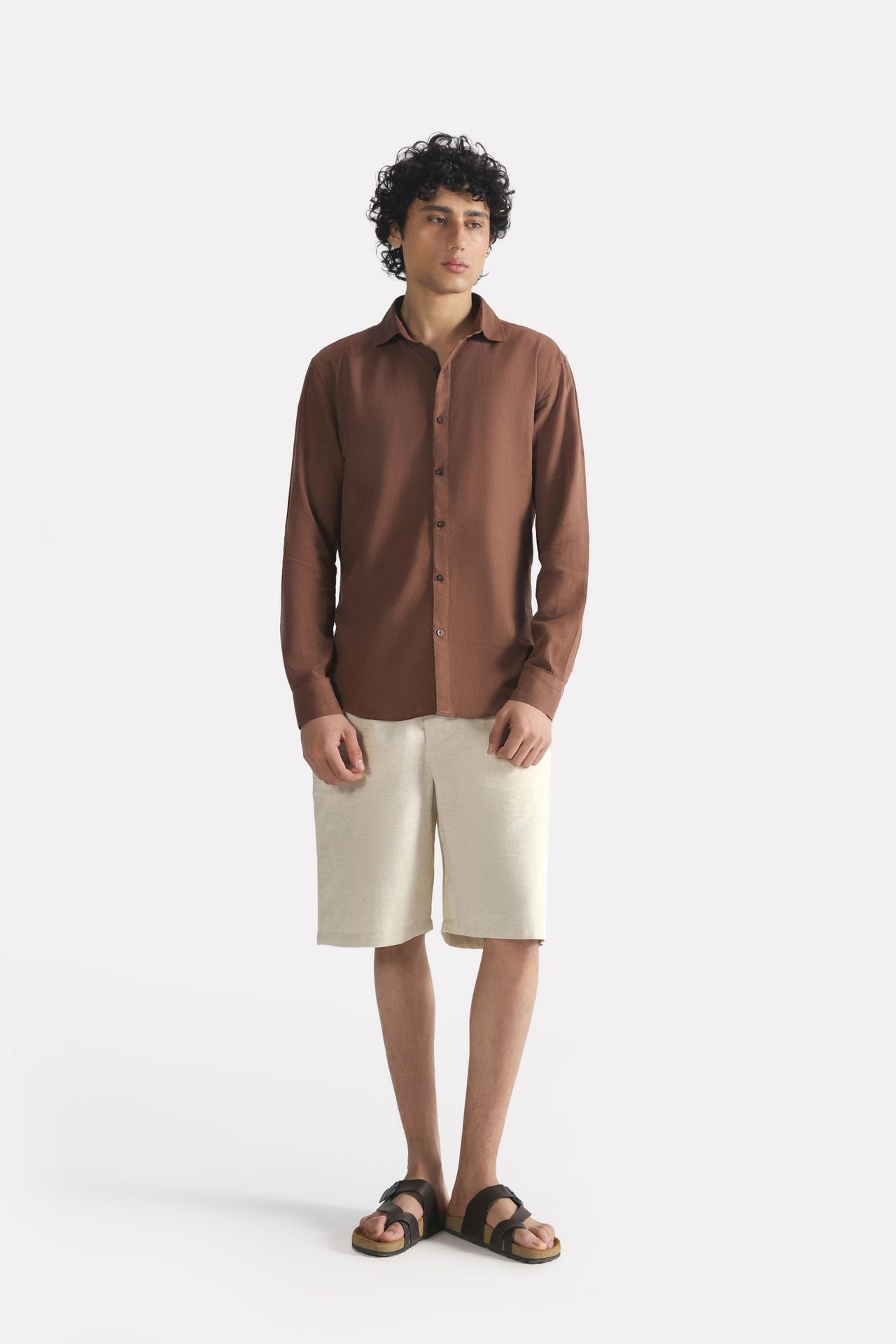 Close-up detail on the chocolate brown premium cotline shirt, by SOLA Pakistan.
