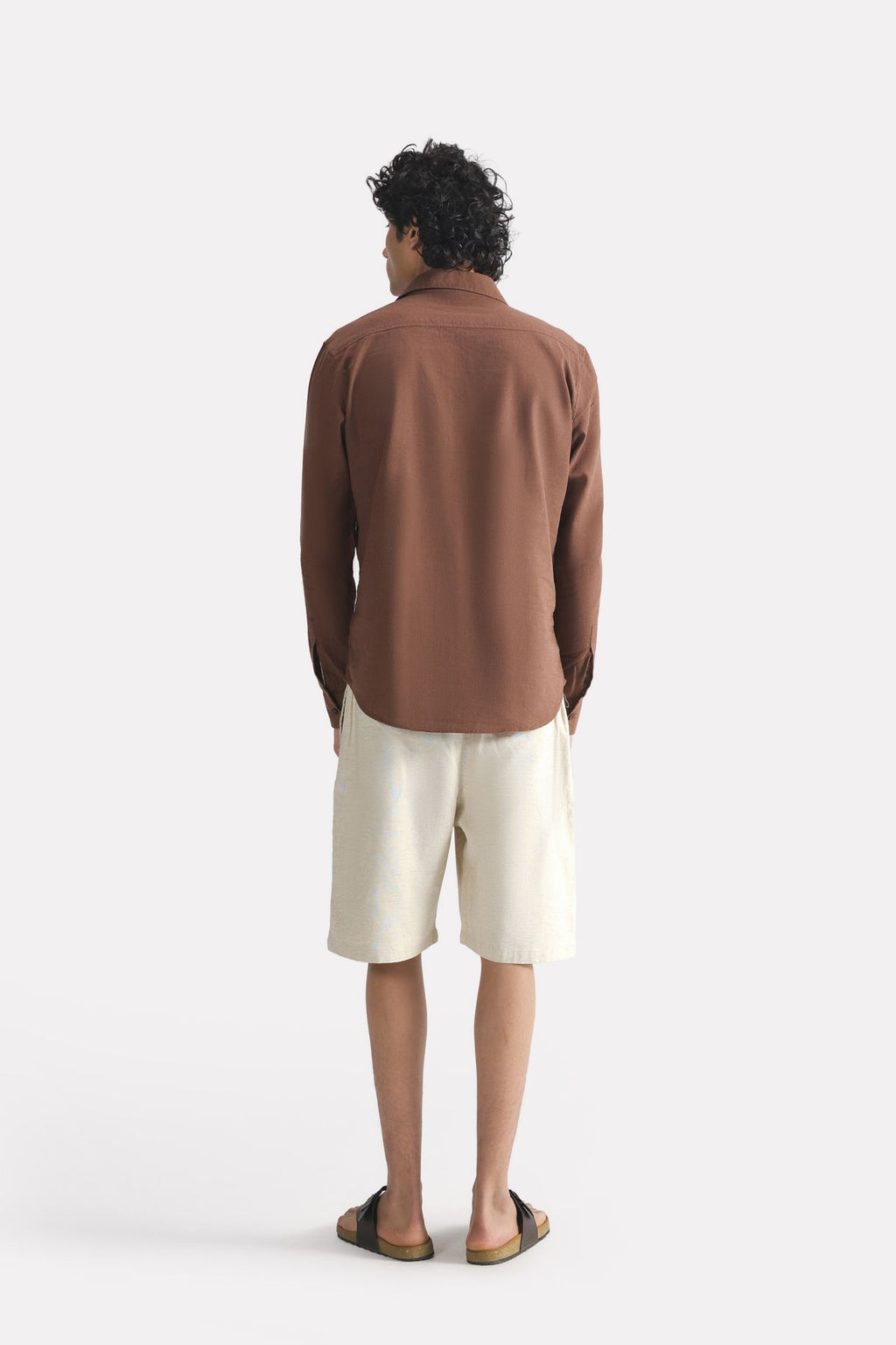Flat lay of the chocolate brown premium cotline shirt, by SOLA Pakistan.
