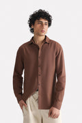 Chocolate brown premium cotline shirt in cotton-linen blend, worn by a model, by SOLA Pakistan.