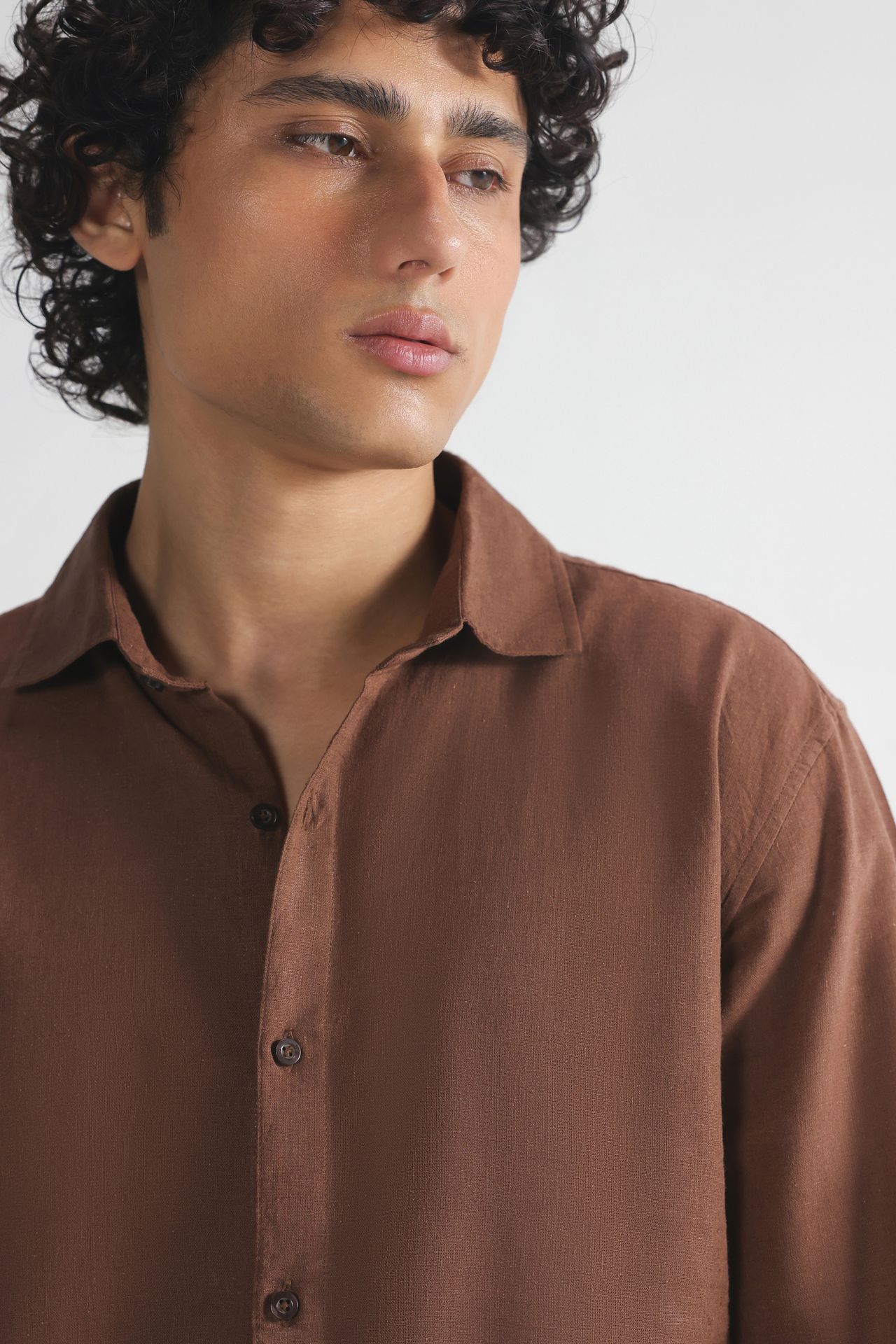 Chocolate brown premium cotline shirt shown in a styled fit, by SOLA Pakistan.
