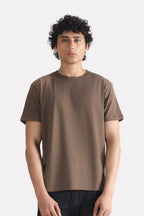 Dark grey (darkmole) regular fit crew neck t-shirt in cotton, worn by a model, by SOLA Pakistan.