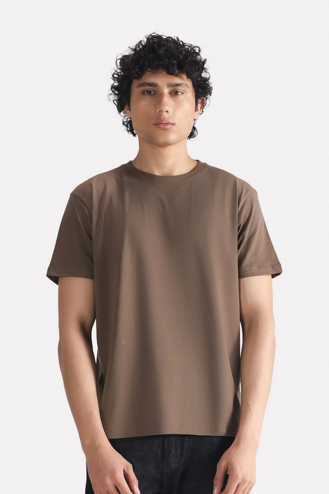 Dark grey (darkmole) regular fit crew neck t-shirt in cotton, worn by a model, by SOLA Pakistan.