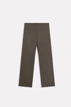 Texture and fabric detail, dark olive barrel-leg pleated trouser, by SOLA Pakistan.