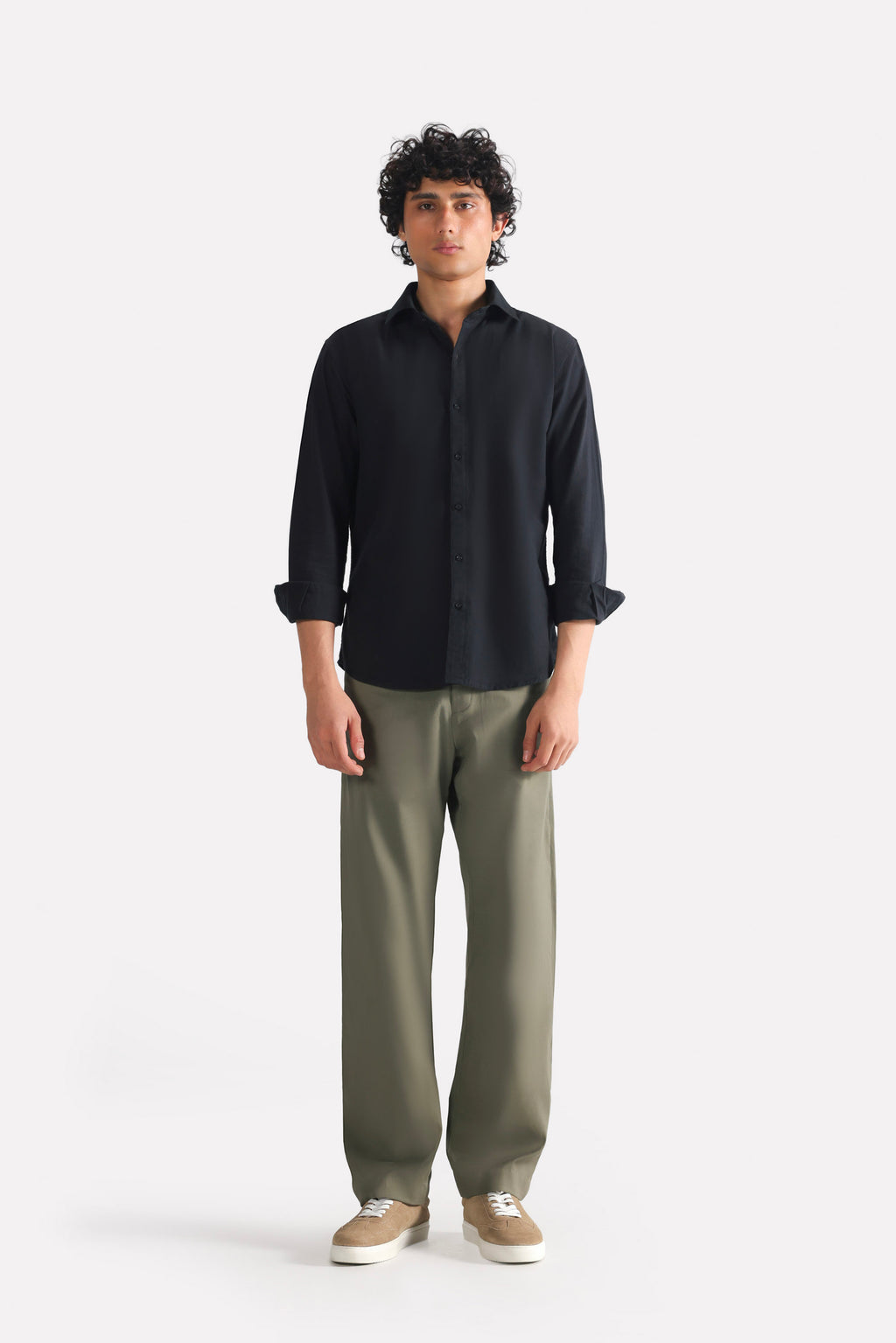 Dark olive straight fit cotton trouser, worn by a model, by SOLA Pakistan.