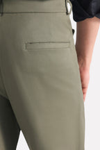 Dark olive straight fit cotton trouser shown in a styled fit, by SOLA Pakistan.