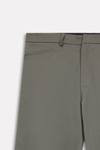 Texture and fabric detail, dark olive straight fit cotton trouser, by SOLA Pakistan.