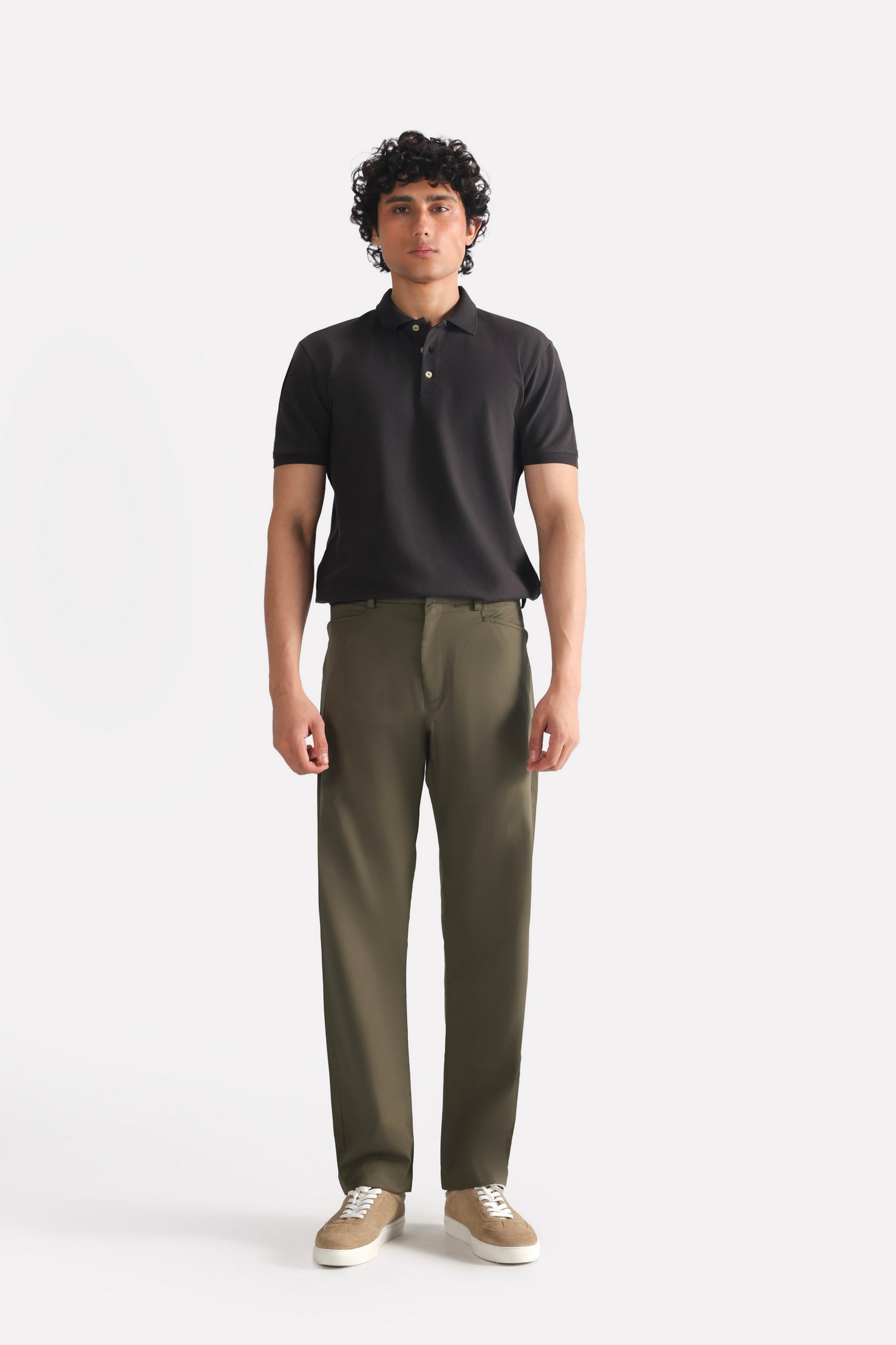 Dark olive straight fit dobby trouser in cotton, worn by a model, by SOLA Pakistan.