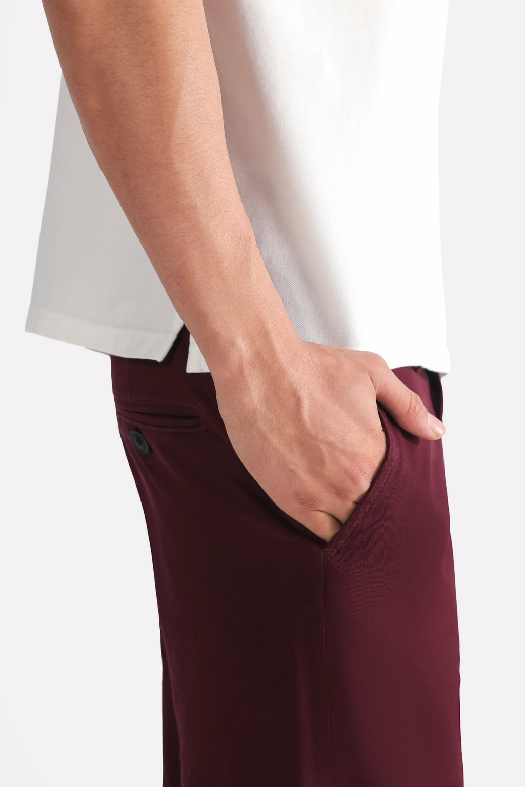 Close-up detail on the dark purple (plum) relaxed fit cotton shorts, by SOLA Pakistan.