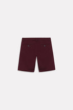 Flat lay of the dark purple (plum) relaxed fit cotton shorts, by SOLA Pakistan.