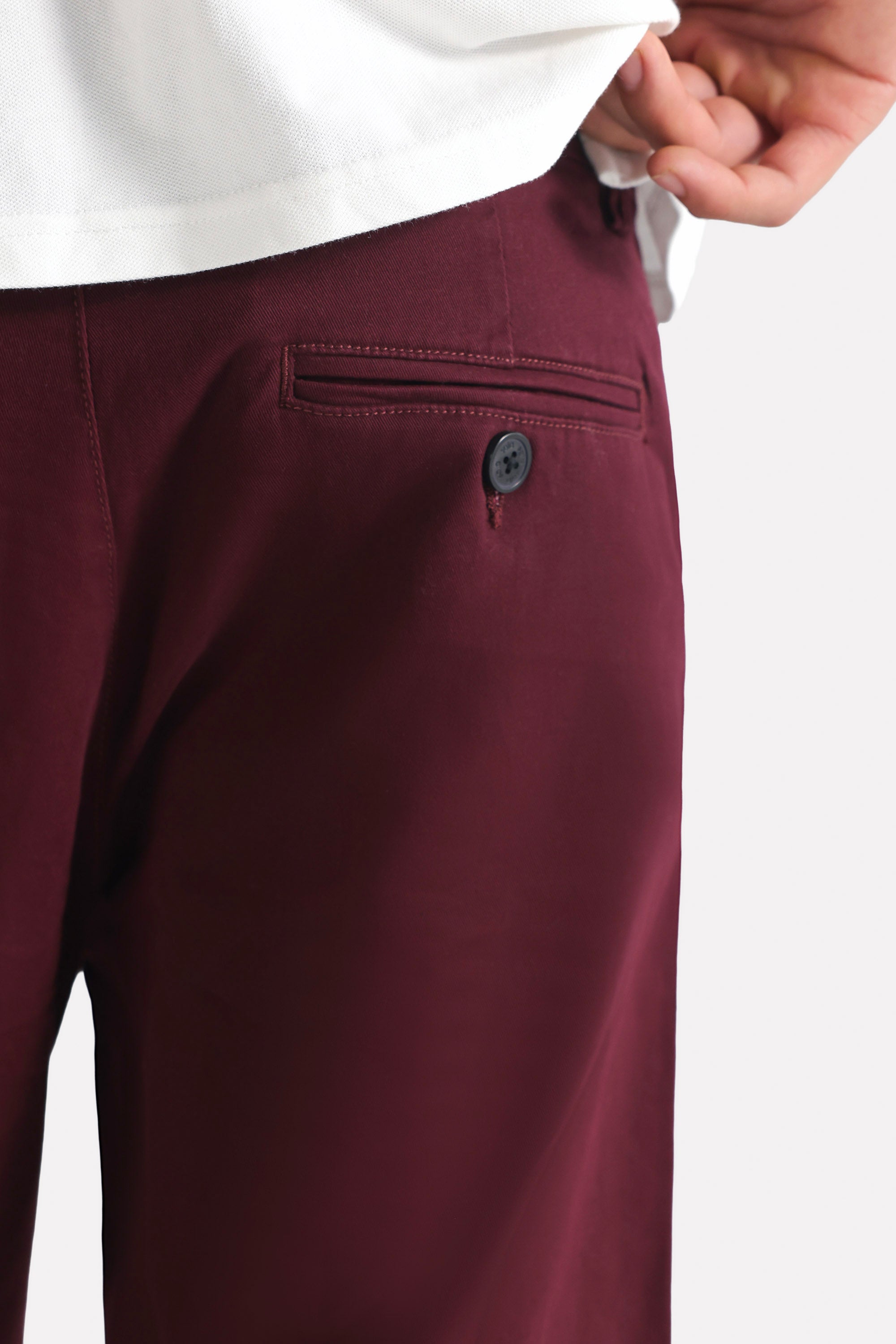 Dark purple (plum) relaxed fit cotton shorts shown in a styled fit, by SOLA Pakistan.
