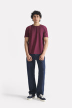 Close-up detail on the dark red (burgundy) regular fit crew neck t-shirt, by SOLA Pakistan.