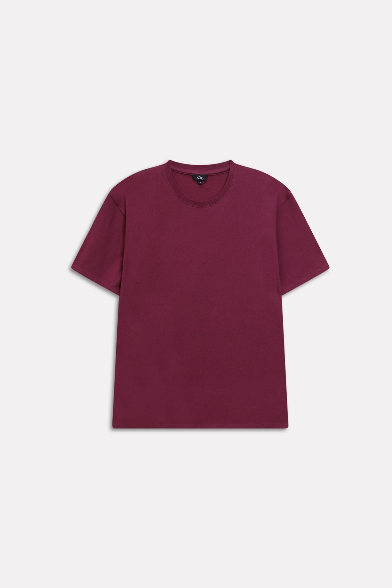 Flat lay of the dark red (burgundy) regular fit crew neck t-shirt, by SOLA Pakistan.